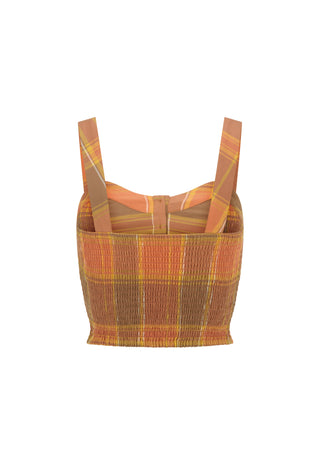 a-cropped-knit-top-with-a-textured-smocked-body-and-wide-shoulder-straps-featuring-a-warm-plaid-pattern-in-orange-brown-and-yellow-shown-against-a-plain-white-background